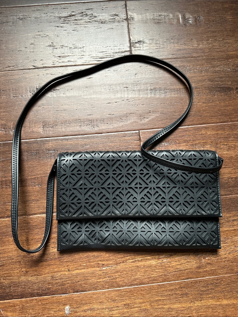 Francesca's Collections Black Laser-Cut Crossbody Bag